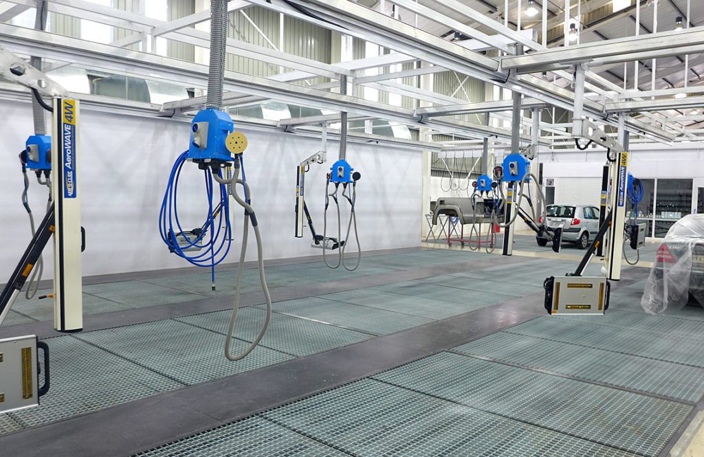 Production preparation area, underfloor extraction, overhead infrared curing and fixed hanging workstation.